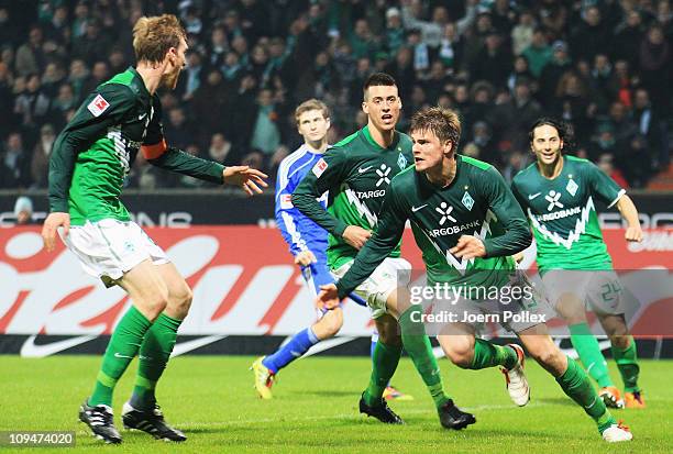 Sebastian Proedl of Bremen celebrates after scoring his team's second goal during the Bundesliga match between Werder Bremen and Bayer Leverkusen at...