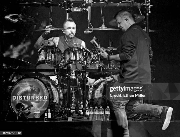 Drummer Mike Wengren and guitarist Dan Donegan of Disturbed perform at T-Mobile Arena on January 12, 2019 in Las Vegas, Nevada.