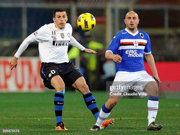 Lucio of FC Inter Milan and Massimo Maccarone of UC Sampdoria compete for the ball during the Serie A match between UC Sampdoria and FC...