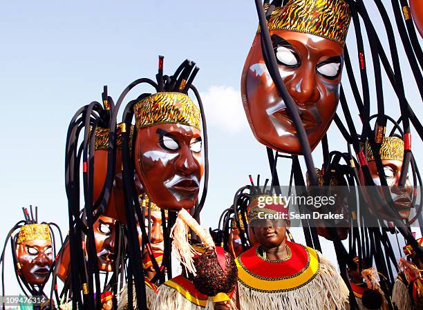 Young masqueraders from the band "The Story Teller" perform at the Red Cross Children's Carnival at the Queen's Park Savannah on February 26, 2011 in...