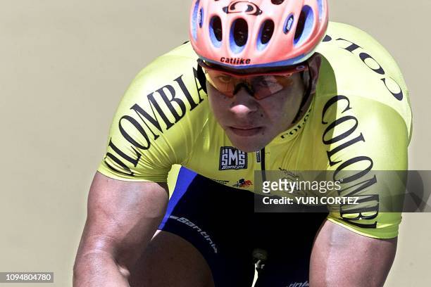 The Panamerican champion of cycling, Colombian Wilson Meneses, competes in the race, 24 November 2002 during his participation in the the XIX Central...