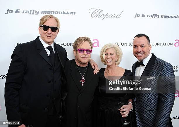 Producer T Bone Burnett, musician Elton John, writer Callie Khouri and David Furnish arrive at the 19th Annual Elton John AIDS Foundation Academy...