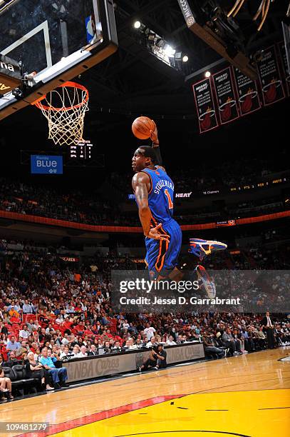 Amar'e Stoudemire of the New York Knicks dunks against the Miami Heat during the game on February 27, 2011 at the American Airlines Arena in Miami,...