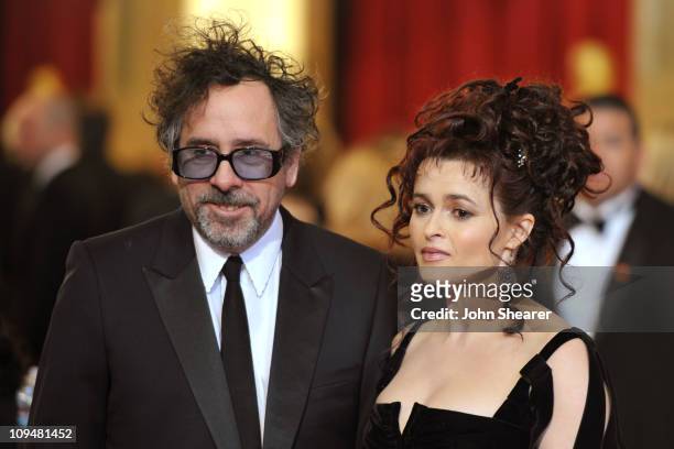 Director Tim Buron and wife actress Helena Bonham Carter arrive at the 83rd Annual Academy Awards held at the Kodak Theatre on February 27, 2011 in...