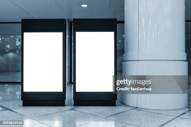 two blank billboards in lobby - panneau commercial photos et images de collection