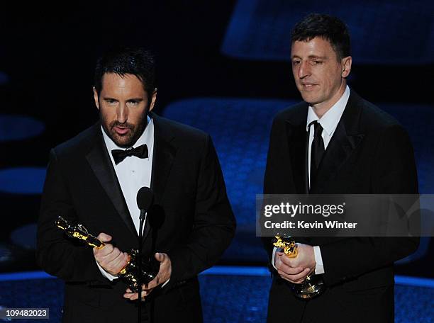 Composers Trent Reznor and Atticus Ross accept the award for Best Original Score for 'The Social Network' onstage during the 83rd Annual Academy...