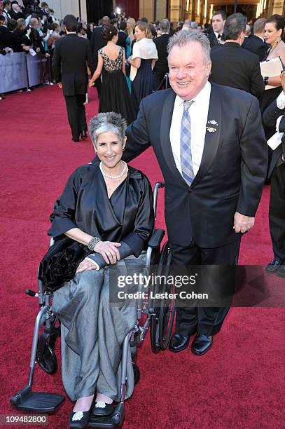 Actor Jack McGee and guest arrive at the 83rd Annual Academy Awards held at the Kodak Theatre on February 27, 2011 in Los Angeles, California.