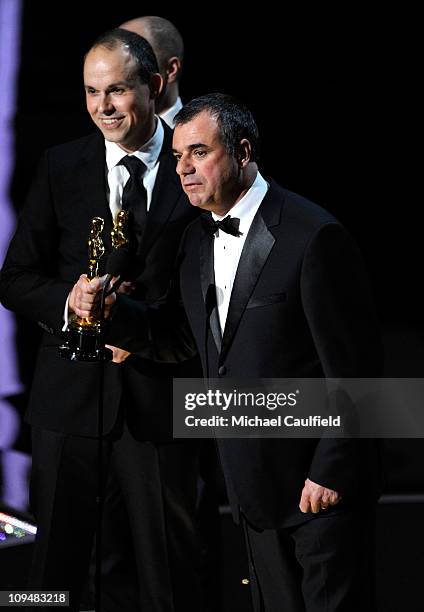 Paul Franklin and Chris Corbould accept award onstage during the 83rd Annual Academy Awards held at the Kodak Theatre on February 27, 2011 in...