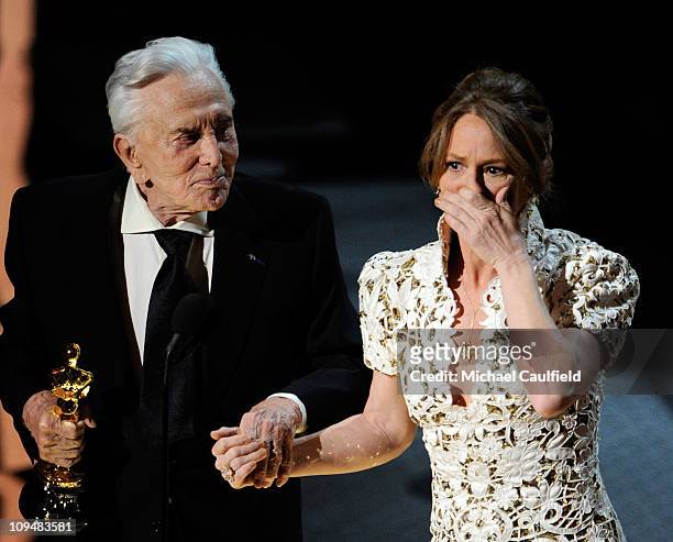 Melissa Leo is presented an award onstage by Kirk Douglas during the 83rd Annual Academy Awards held at the Kodak Theatre on February 27, 2011 in...