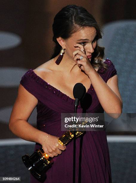 Actress Natalie Portman accepts the award for Best Performance by an Actress in a Leading Role for the 'Black Swan' onstage during the 83rd Annual...