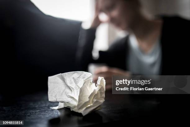 In this photo illustration a handkerchief is pictured in front of a sich woman on February 05, 2019 in Berlin, Germany.