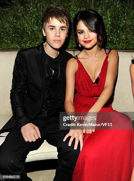 Justin Bieber and Selena Gomez attend the 2011 Vanity Fair Oscar Party Hosted by Graydon Carter at the Sunset Tower Hotel on February 27, 2011 in...