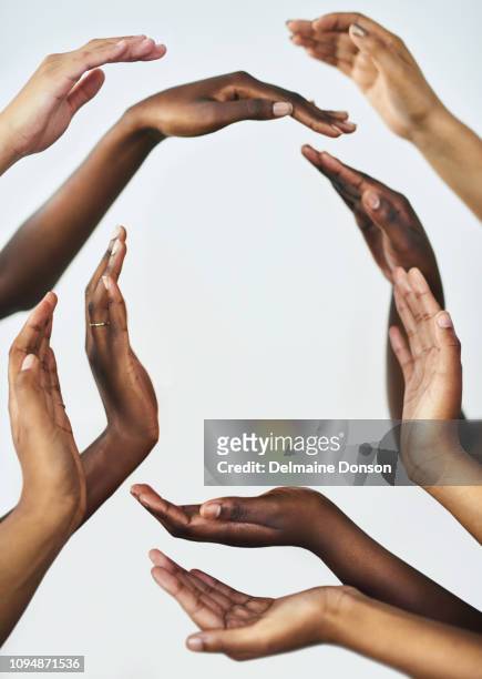 the circle of life begins with a woman - hands in a circle stock pictures, royalty-free photos & images