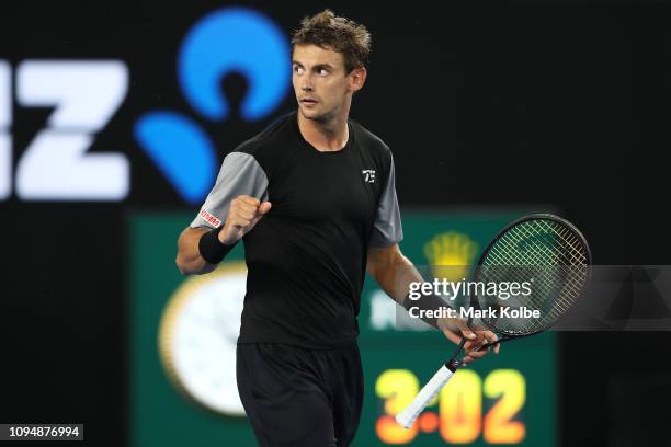 Henri Laaksonen of Switzerland celebrates winning the fourth set in his second round match against Alex De Minaur of Australia during day three of...