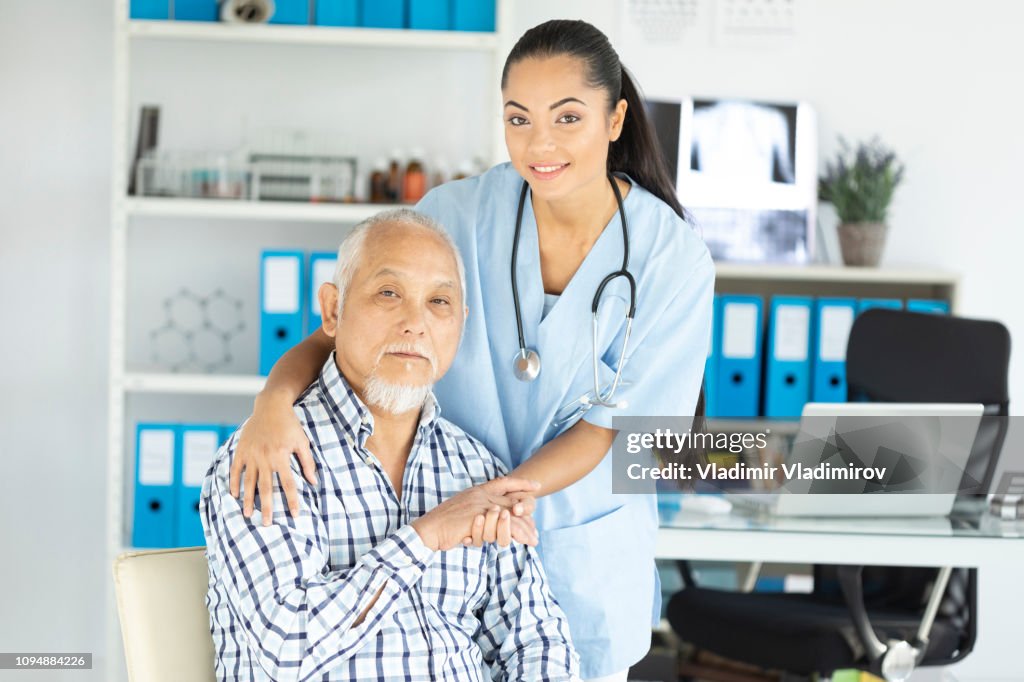 Young asian doctor and her patient in cabin