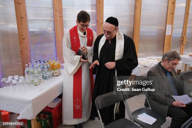 Rabbi Andreas Nachama , and Protestant priest Gregor Hohberg chat prior to speaking at the finissage of the House of One temporary structure on...