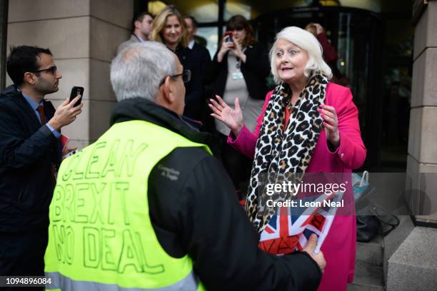Pro-Brexit protestor discusses a further Brexit referendum with MP for Mitcham and Morden Siobhan McDonagh following a photocall to push Labour Party...