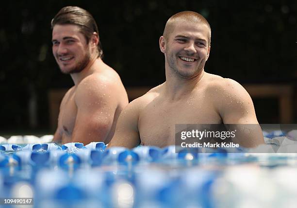 Ben Mowen and Drew Mitchell share a laugh during a pool recovery session at a Waratahs Super Rugby training session at at the members pool at the...