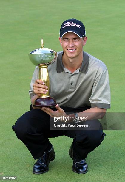 Adam Scott of Australia with the trophy after winning the Alfred Dunhill Championship at Houghton G.C, in Johannesburg, South Africa. Mandatory...