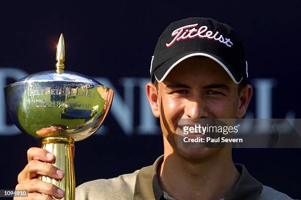 Adam Scott of Australia with the trophy after winning the Alfred Dunhill Championship at Houghton G.C, in Johannesburg, South Africa. Digital...