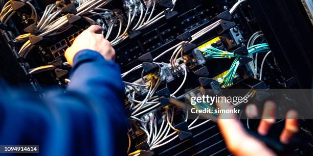 it engineers working in server room - 2 point perspective stock pictures, royalty-free photos & images