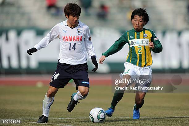 Park Joo Ho of Jubilo Iwata and Akihiro Noda of FC Gifu challenge for the ball during the preseason friendly match between FC Gifu and Jubilo Iwata...