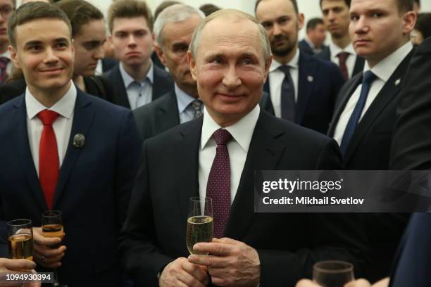 Russian President Vladimir Putin smiles during the awarding ceremony for young scientists at the Kremlin February 7, 2019 in Moscow, Russia. Russia...