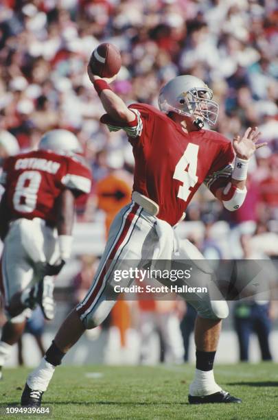 Kirk Herbstreit, Quarterback for the Ohio State Buckeyes throws the ball downfield during the NCAA Florida Citrus Bowl college football bowl game...