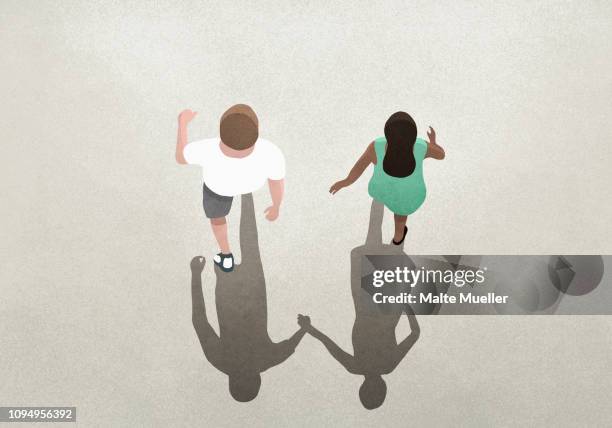 ilustraciones, imágenes clip art, dibujos animados e iconos de stock de view from above shadow of couple holding hands - adios