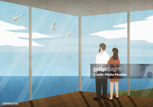illustrazioni stock, clip art, cartoni animati e icone di tendenza di couple enjoying ocean view from beach house - tre animali