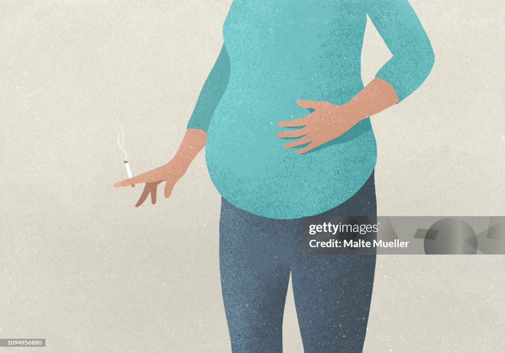 Pregnant woman smoking cigarette