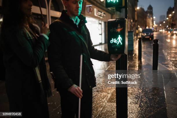 wet night in the city centre - accessibility blind stock pictures, royalty-free photos & images