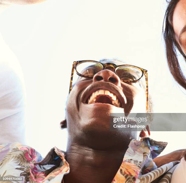 portrait of young man - low angle view man stock pictures, royalty-free photos & images