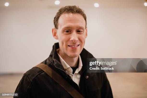 portrait of a male smiling wearing a warm coat - blind person stock pictures, royalty-free photos & images
