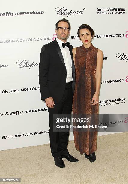 Actor Jason Lee and Ceren Alkac arrive at the 19th Annual Elton John AIDS Foundation's Oscar viewing party held at the Pacific Design Center on...