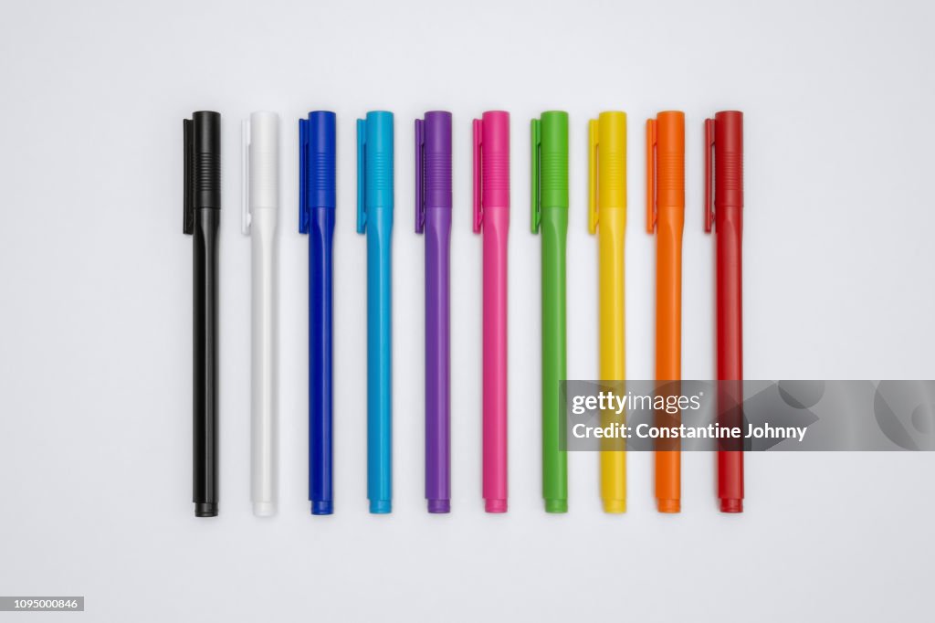 Colorful Pens on White Background