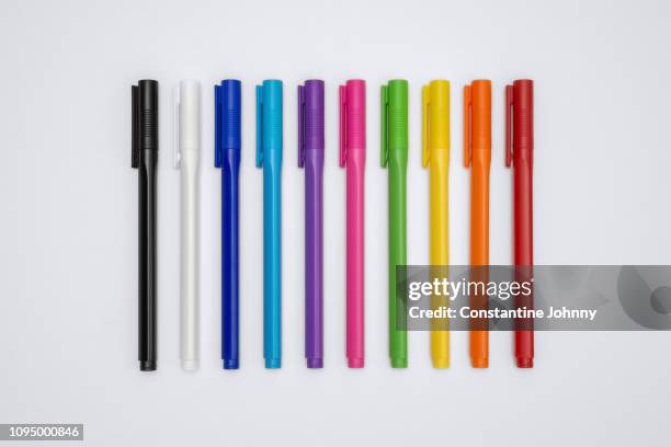 colorful pens on white background - penne foto e immagini stock