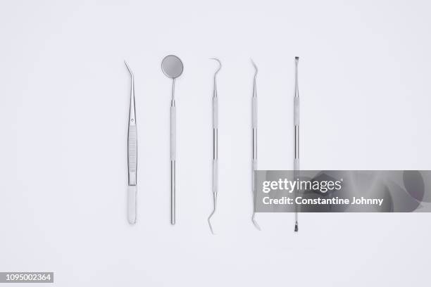 dental equipment over white background - angled mirror stock pictures, royalty-free photos & images