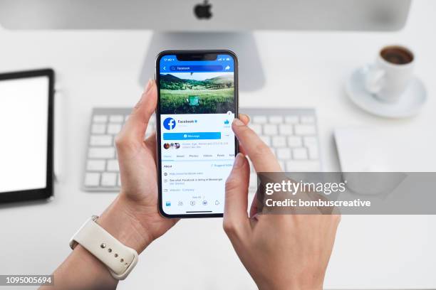 facebook profile on apple iphone x - facebook profile stock pictures, royalty-free photos & images