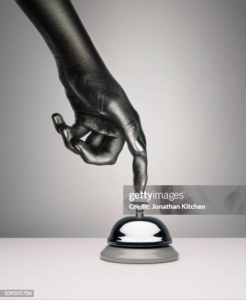 finger pressing bell - receptiebel stockfoto's en -beelden