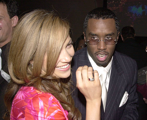 Sean "Puffy" Combs & Jennifer Lopez during The 42nd Annual GRAMMY Awards - Arista Records Pre-GRAMMY Party at Beverly Hilton Hotel in Beverly Hills,...