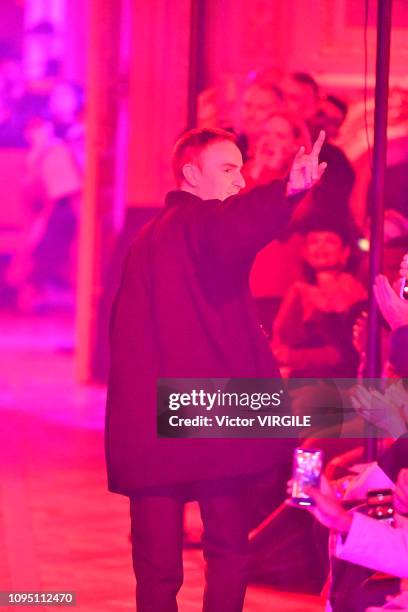 Fashion designer Raf Simons walks the runway during the Raf Simons Menswear Fall Winter 2019/2020 fashion show as part of Paris Fashion Week on...