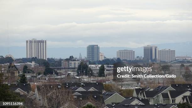 Urban skyline of Oakland, California on an overcast day, January 8, 2019.