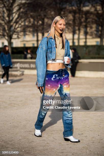 Model Soo Joo Park, is seen in the streets of Paris after the Off-White show on January 16, 2019 in Paris, France.