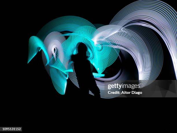 human figure with in a futuristic, virtual robotic environment. 3d. light painting - rendering kinder stock-fotos und bilder