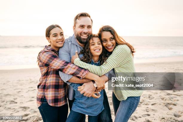 happy family with two teen kids - family teens stock pictures, royalty-free photos & images