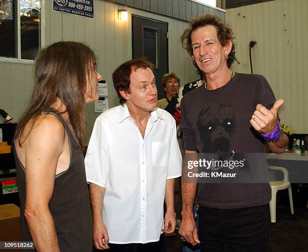 Malcolm Young and Angus Young of AC/DC with Keith Richards of The Rolling Stones