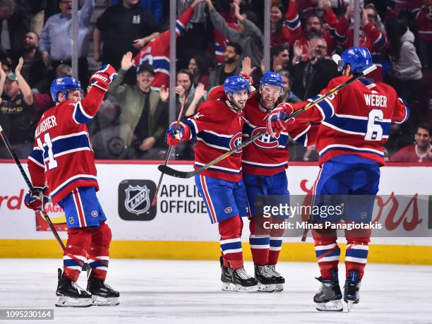 Shea Weber of the Montreal Canadiens celebrates his third period goal with teammates Brendan Gallagher, Phillip Danault and Jonathan Drouin against...