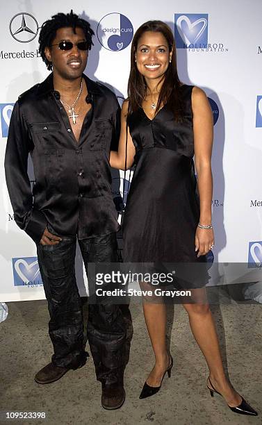 Kenny "Babyface" Edmonds and wife Tracey Edmonds during Holly Robinson Peete & Rodney Peete and Mercedes Benz Honor Muhammad Ali With The Designcure...
