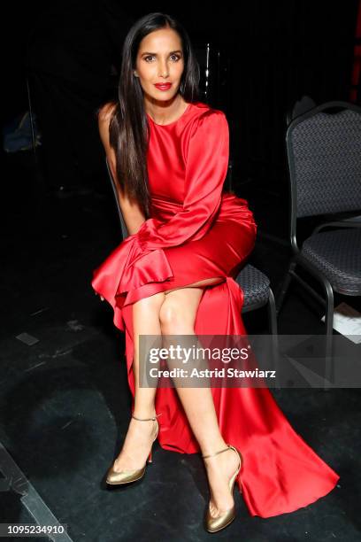 Padma Lakshmi poses backstage during The American Heart Association's Go Red for Women Red Dress Collection 2019 at Hammerstein Ballroom on February...